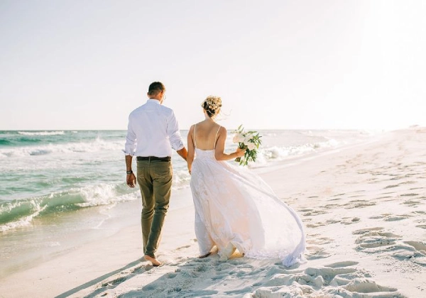 Factors to consider when choosing the time of day for a beach wedding ceremony