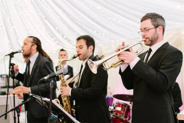 Hiring a live band or DJ for a destination wedding