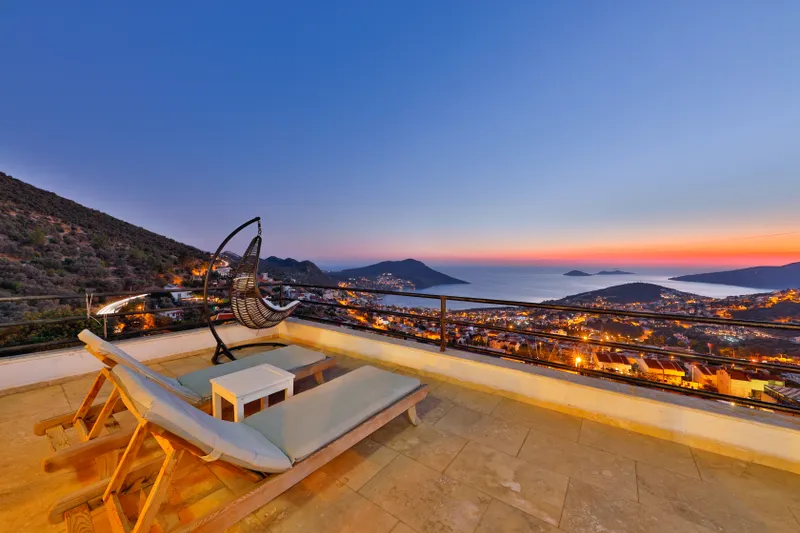 An intimate wedding setup at a Kalkan beach club, highlighting the serene atmosphere and stunning sea views, ideal for couples seeking a romantic venue.