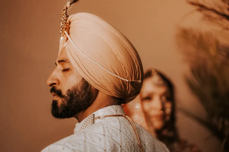 A stunning Sikh wedding in Turkey with guests enjoying a lavish vegetarian feast and traditional rituals.