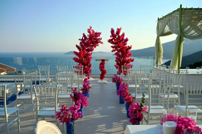 Outdoor villa wedding ceremony setup overlooking the sea in Kalkan, Turkey