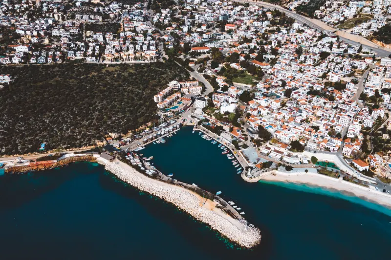 An elegant wedding setup illustrating the choice between Fethiye vs Kalkan for a destination wedding, focusing on guest logistics and accommodations.