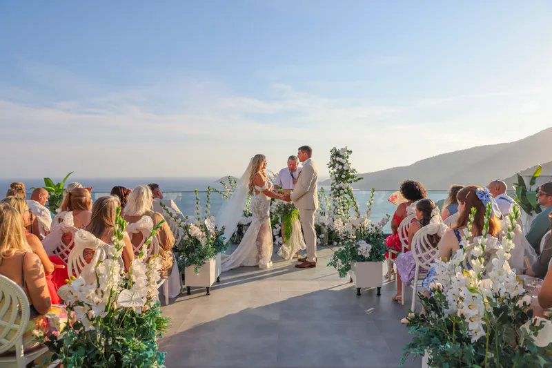Guests enjoying a lively dance floor at a Kalkan wedding for 50–80 guests, highlighting the vibrant atmosphere and elegant decor.