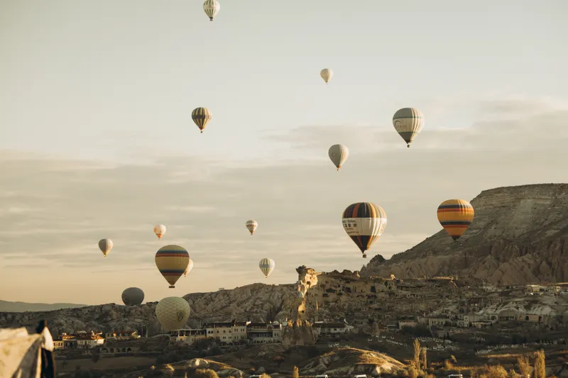 A detailed comparison of wedding logistics and guest accommodations in Göreme, emphasizing the advantages of choosing the right base for your Uçhisar vs Göreme vs Ürgüp wedding.