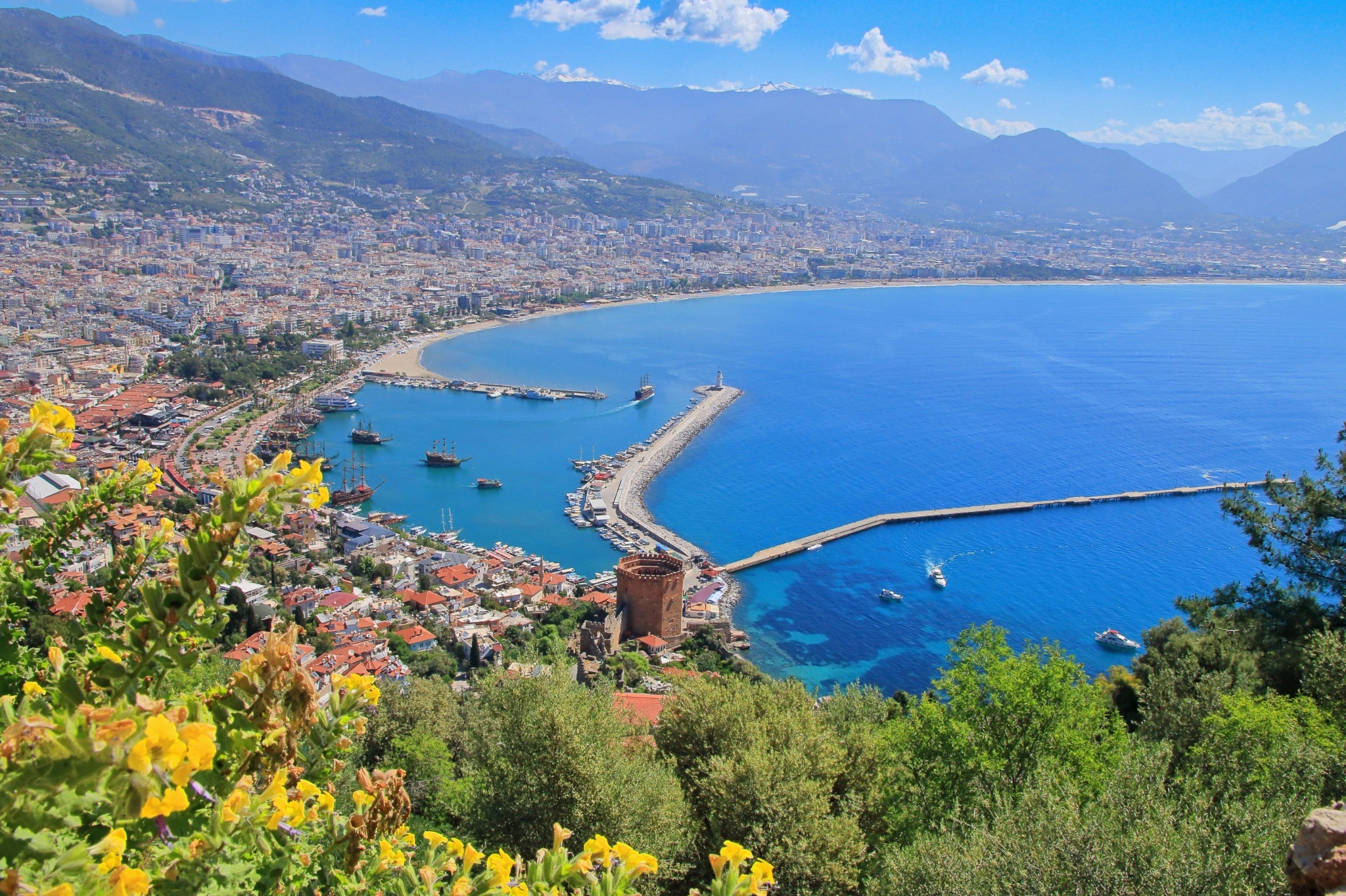 Panoramic view of Alanya Castle, the Red Tower and the Mediterranean harbour.