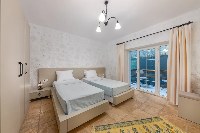 Comparing the benefits of centralized Bodrum wedding guest accommodation versus spreading guests across various locations.