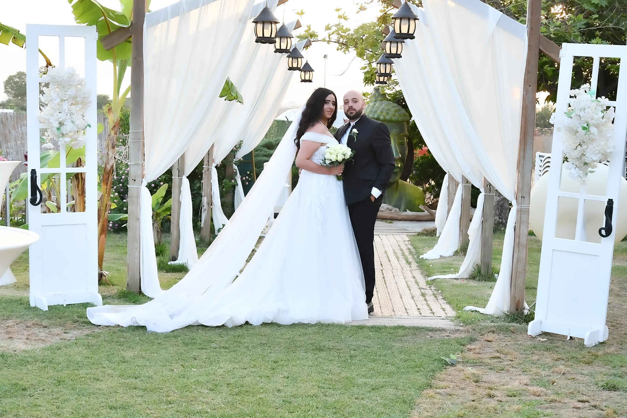 Bride and groom in a romantic garden wedding portrait in Antalya