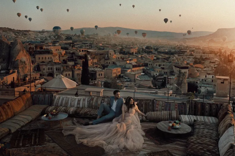 A cozy and luxurious cave hotel in Cappadocia, perfect for wedding guest accommodation, blending comfort with stunning natural surroundings.