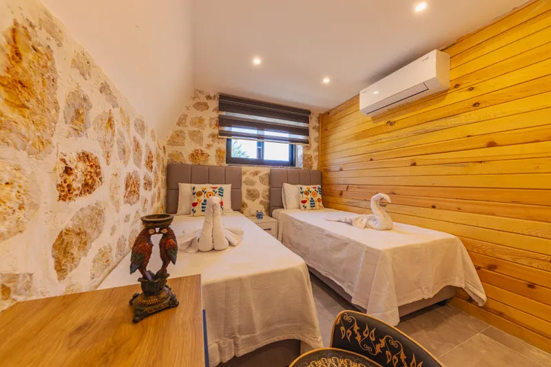 Detailed comparison of Fethiye wedding guest accommodation areas: Ölüdeniz, Kayaköy, and Town Centre.